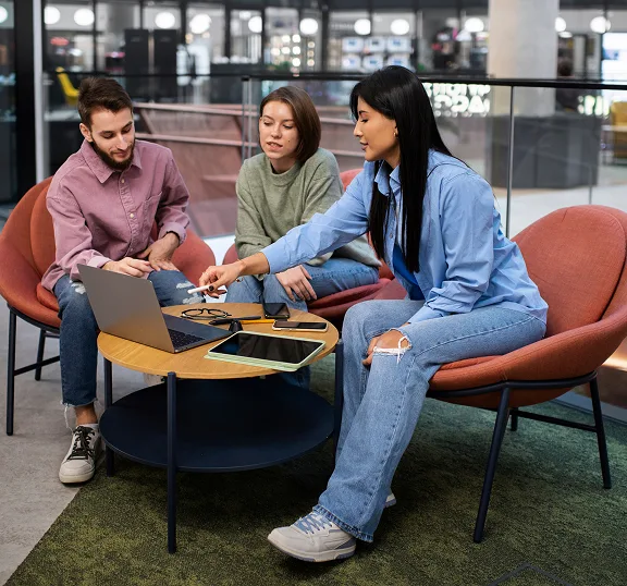 Team collaborating at a round table